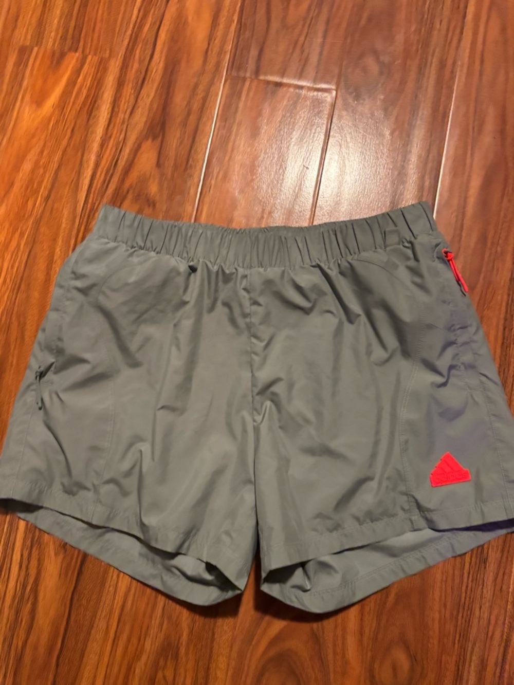 Green Adidas athletic shorts
